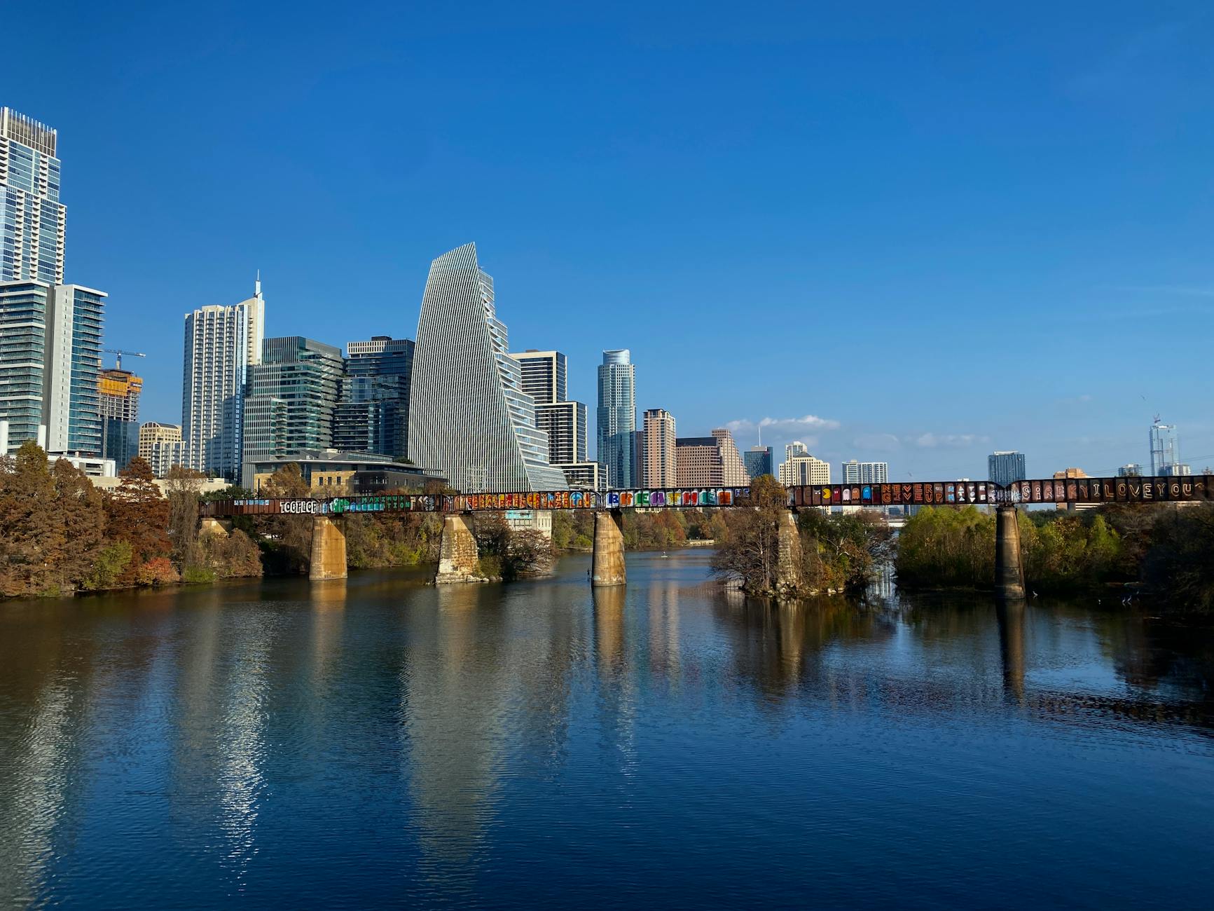 city skyline across body of water